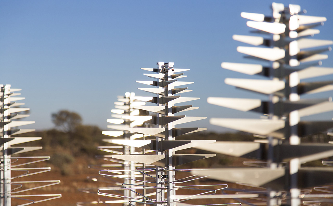 A close-up of the SKA’s low-frequency prototype antennas in WA - they look like whote metal pinecones against a blue sky