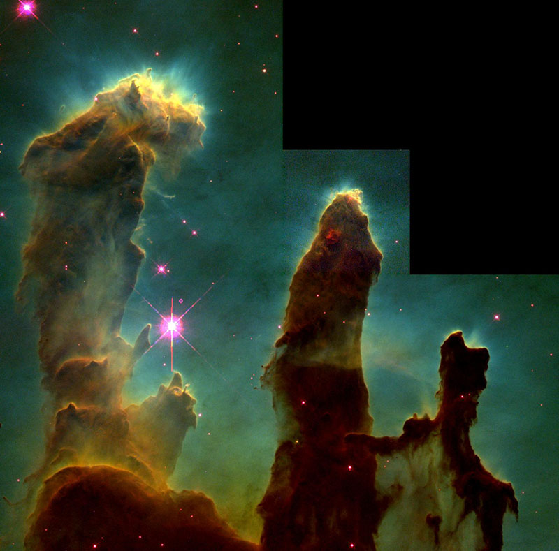 Gas clouds collapsing to form new stars in the Pillars of Creation